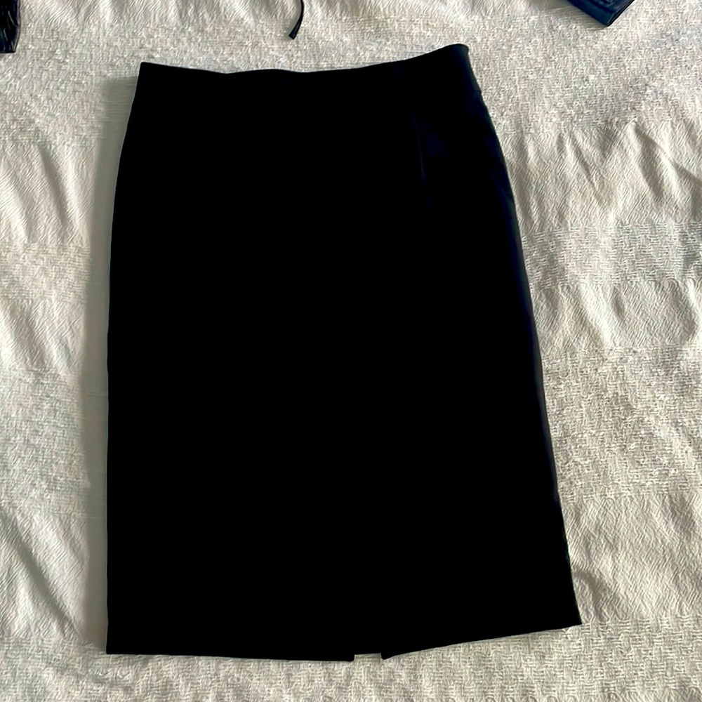Authentic, love Moschino, black pencil skirt. Perfect for office dress code.